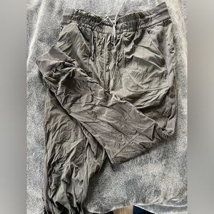 Lululemon beyond the studio joggers. Dark grey. Ruched on the sides.